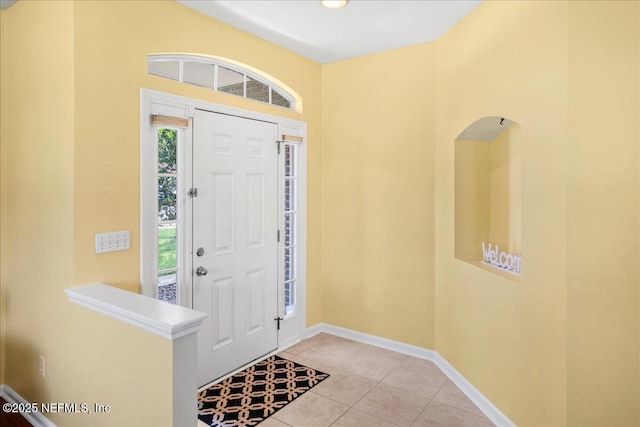 11092 Turnbridge Dr Unit 74, Jacksonville, FL 32256 - tiled foyer featuring baseboards
