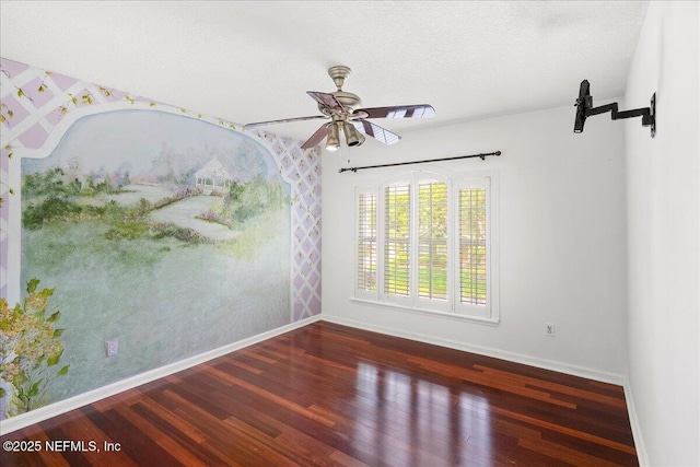 11092 Turnbridge Dr Unit 74, Jacksonville, FL 32256 - empty room with a ceiling fan, wood finished floors, baseboards, and a barn door