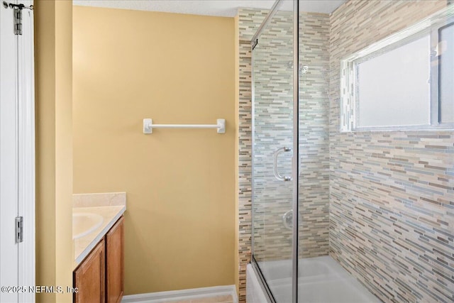 11092 Turnbridge Dr Unit 74, Jacksonville, FL 32256 - bathroom featuring vanity and shower / bath combination with glass door