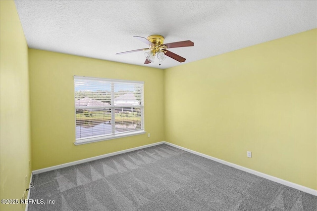 11092 Turnbridge Dr Unit 74, Jacksonville, FL 32256 - carpeted spare room featuring ceiling fan, baseboards, and a textured ceiling