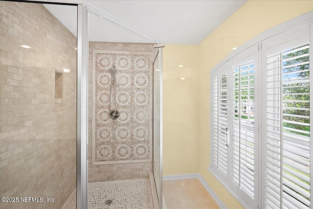 11092 Turnbridge Dr Unit 74, Jacksonville, FL 32256 - full bathroom featuring a shower stall, tile patterned floors, and baseboards