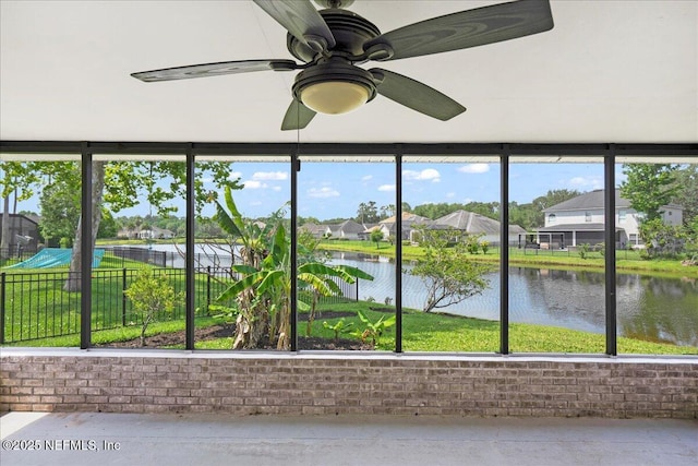 11092 Turnbridge Dr Unit 74, Jacksonville, FL 32256 - unfurnished sunroom with a water view, a residential view, and brick wall