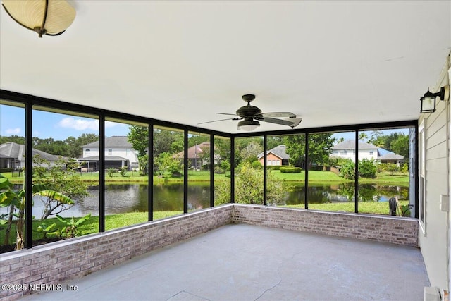 11092 Turnbridge Dr Unit 74, Jacksonville, FL 32256 - unfurnished sunroom featuring a water view, a ceiling fan, and a residential view