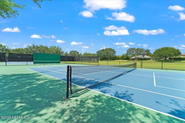 11092 Turnbridge Dr Unit 74, Jacksonville, FL 32256 - view of tennis court with community basketball court