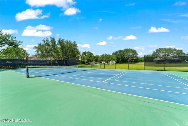 11092 Turnbridge Dr Unit 74, Jacksonville, FL 32256 - view of tennis court with community basketball court