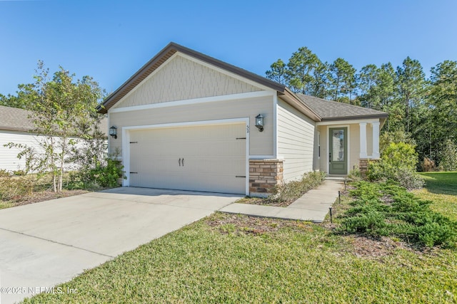 craftsman house with a garage, stone siding, and concrete driveway