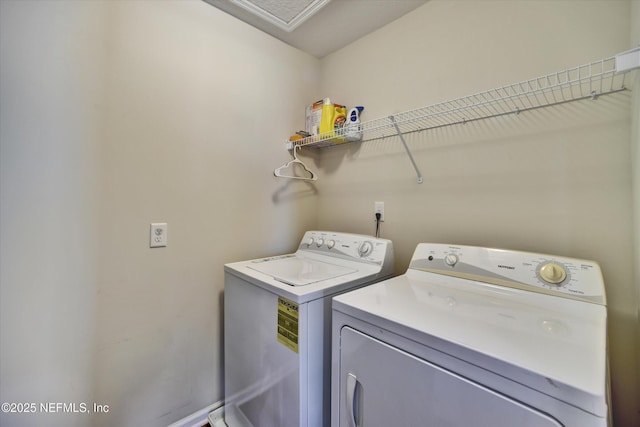 8672 Ribbon Falls Ln, Jacksonville, FL 32244 - clothes washing area featuring washer and clothes dryer and baseboards