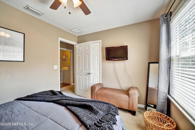 8672 Ribbon Falls Ln, Jacksonville, FL 32244 - bedroom featuring carpet flooring, ceiling fan, washer and dryer, and baseboards