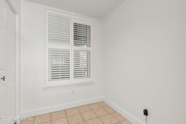 4776 Amelia Island Pkwy Unit 74, Fernandina Beach, FL 32034 - unfurnished room with baseboards and light tile patterned floors