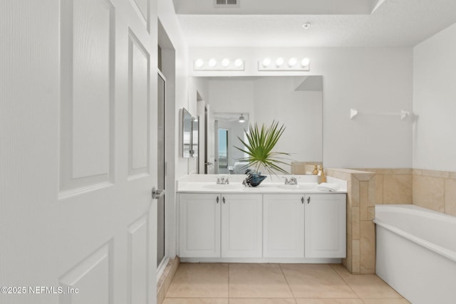 4776 Amelia Island Pkwy Unit 74, Fernandina Beach, FL 32034 - full bath with a bath, tile patterned floors, and double vanity