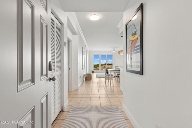 4776 Amelia Island Pkwy Unit 74, Fernandina Beach, FL 32034 - corridor with light tile patterned floors and baseboards