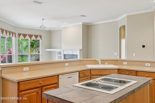 2260 Harbor Lake Dr, Fleming Island, FL 32003 - kitchen featuring white appliances, a sink, ornamental molding, a kitchen island, and ceiling fan