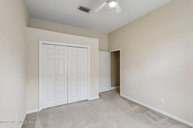 2260 Harbor Lake Dr, Fleming Island, FL 32003 - unfurnished bedroom with carpet floors, a closet, and baseboards