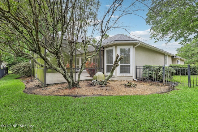 2260 Harbor Lake Dr, Fleming Island, FL 32003 - view of property exterior with a patio and stucco siding