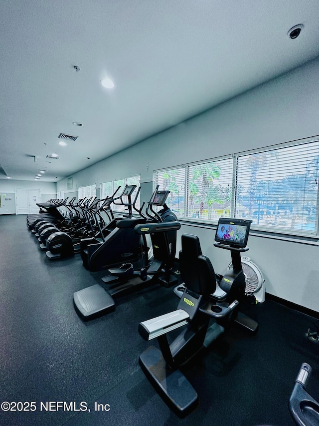 workout area featuring recessed lighting