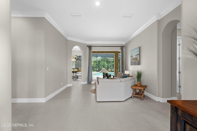 389 Summerset Dr, Saint Johns, FL 32259 - living area featuring arched walkways, ornamental molding, and baseboards