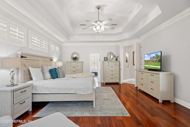 389 Summerset Dr, Saint Johns, FL 32259 - bedroom featuring a tray ceiling, dark wood-style flooring, ornamental molding, ceiling fan, and baseboards