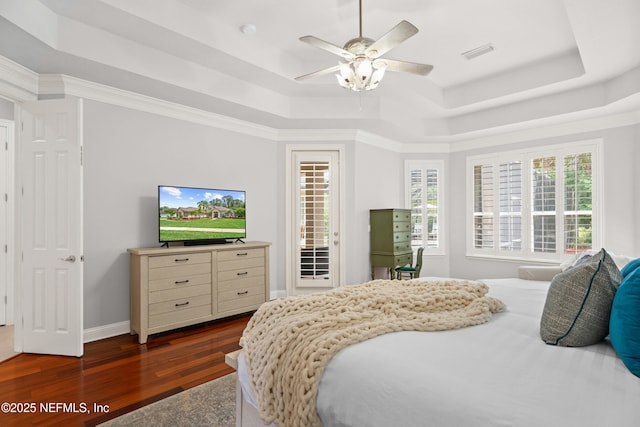 389 Summerset Dr, Saint Johns, FL 32259 - bedroom with a raised ceiling, dark wood finished floors, access to exterior, a ceiling fan, and baseboards