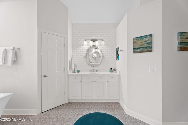 389 Summerset Dr, Saint Johns, FL 32259 - full bath featuring baseboards, tile patterned floors, vanity, and a freestanding bath