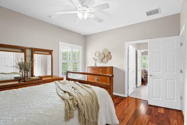 389 Summerset Dr, Saint Johns, FL 32259 - bedroom with wood finished floors, baseboards, and a ceiling fan