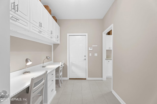 389 Summerset Dr, Saint Johns, FL 32259 - laundry room with baseboards and light tile patterned floors