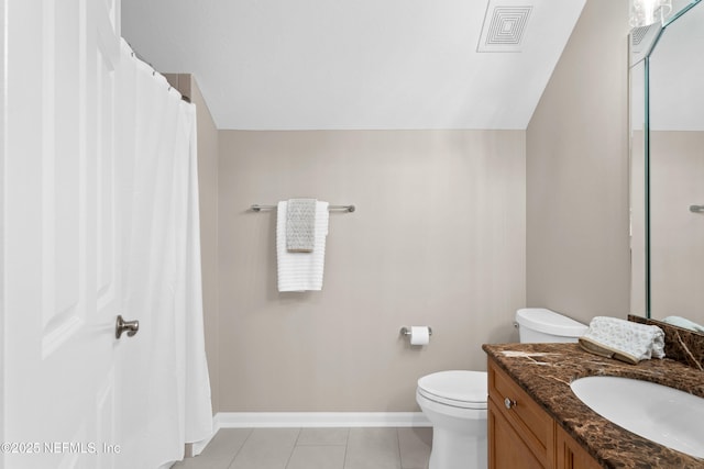 389 Summerset Dr, Saint Johns, FL 32259 - full bathroom featuring tile patterned floors, baseboards, toilet, and vanity
