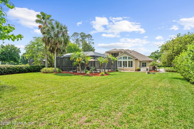389 Summerset Dr, Saint Johns, FL 32259 - view of green lawn featuring glass enclosure
