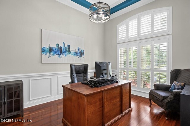 389 Summerset Dr, Saint Johns, FL 32259 - home office with a chandelier, crown molding, dark wood-style flooring, a decorative wall, and a wainscoted wall