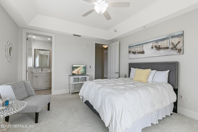 932 1st St N Unit 902, Jacksonville Beach, FL 32250 - bedroom with light colored carpet, a tray ceiling, baseboards, and recessed lighting