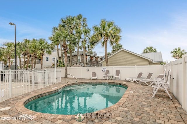 932 1st St N Unit 902, Jacksonville Beach, FL 32250 - community pool with a patio and fence