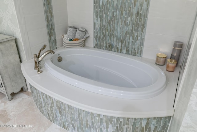 932 1st St N Unit 902, Jacksonville Beach, FL 32250 - bathroom with a bath and tile walls