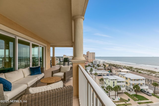 932 1st St N Unit 902, Jacksonville Beach, FL 32250 - balcony featuring view of water and beach and an outdoor hangout area