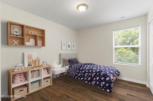 1343 Pangola Dr, Jacksonville, FL 32205 - bedroom featuring wood finished floors and a textured ceiling