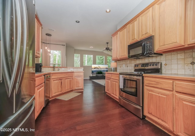 kitchen featuring appliances with stainless steel finishes, recessed lighting, backsplash, dark wood-style floors, and light brown cabinets