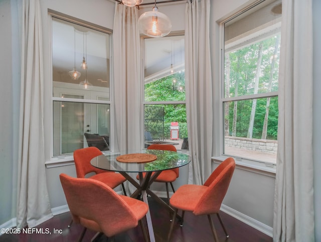 dining room featuring baseboards