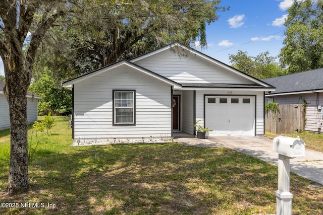 ranch-style home featuring concrete driveway and a garage