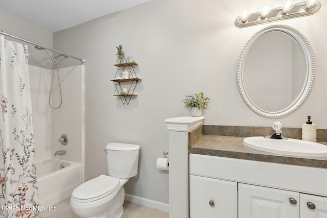 full bathroom with toilet, tile patterned floors, vanity, shower / bath combo with shower curtain, and baseboards