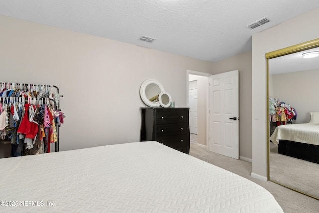 bedroom with carpet floors, a closet, and baseboards