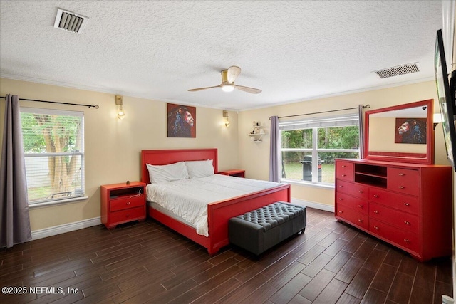 221 Thornloe Dr, Saint Johns, FL 32259 - bedroom with ornamental molding, dark wood-style flooring, baseboards, a textured ceiling, and a ceiling fan