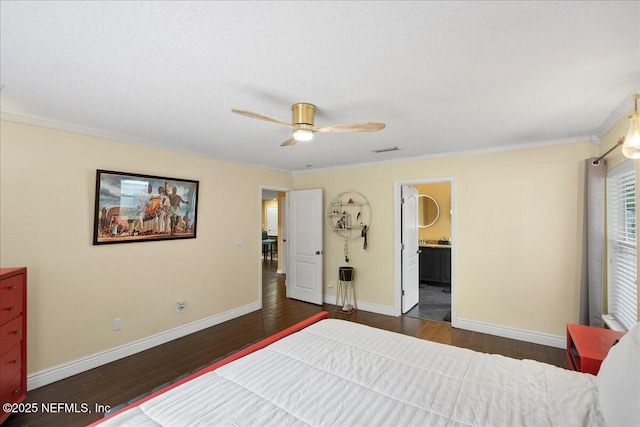 221 Thornloe Dr, Saint Johns, FL 32259 - bedroom with dark wood-style flooring, ornamental molding, baseboards, ceiling fan, and ensuite bath
