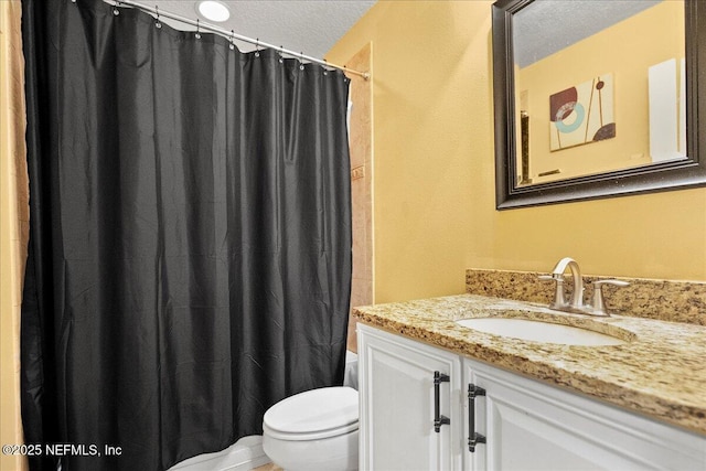 221 Thornloe Dr, Saint Johns, FL 32259 - bathroom with toilet, a textured ceiling, and vanity