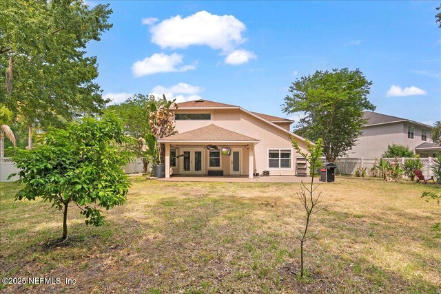 221 Thornloe Dr, Saint Johns, FL 32259 - back of property with a patio area, ceiling fan, stucco siding, cooling unit, and french doors