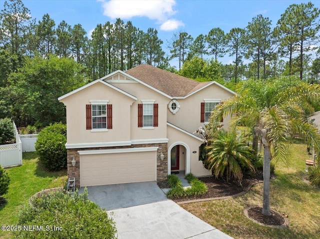 221 Thornloe Dr, Saint Johns, FL 32259 - view of front facade with concrete driveway, an attached garage, stucco siding, stone siding, and roof with shingles