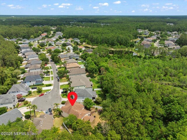 221 Thornloe Dr, Saint Johns, FL 32259 - aerial overview of property's location with a heavily wooded area and nearby suburban area