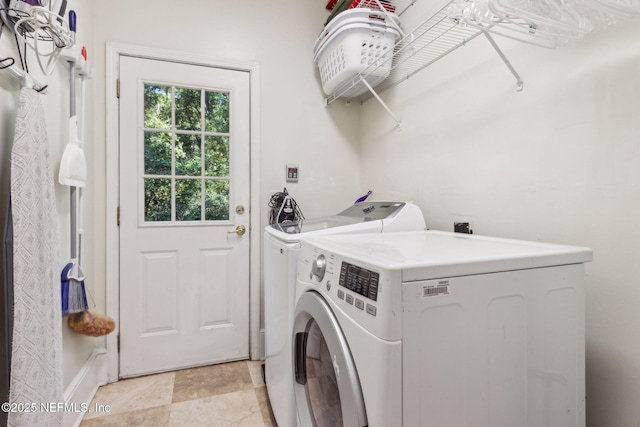 96448 Marsh Hen Rd, Fernandina Beach, FL 32034 - clothes washing area featuring washing machine and dryer