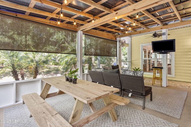 96448 Marsh Hen Rd, Fernandina Beach, FL 32034 - sunroom featuring a ceiling fan and outdoor dining area