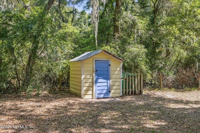 96448 Marsh Hen Rd, Fernandina Beach, FL 32034 - view of shed featuring a forest view