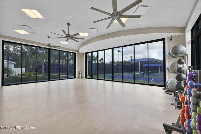 334 Continuum Loop, Yulee, FL 32097 - unfurnished room with ceiling fan, plenty of natural light, and wood finished floors
