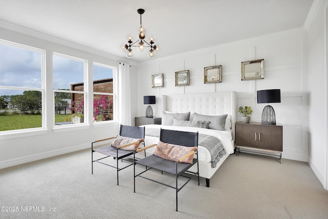 bedroom with a chandelier, baseboards, carpet, and ornamental molding