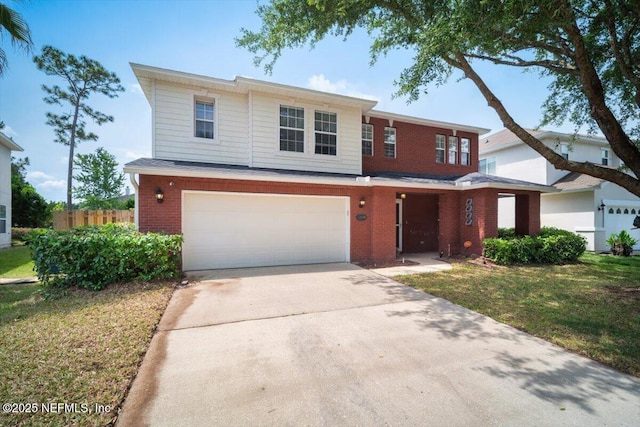 12198 Pebble Point Dr S, Jacksonville, FL 32218 - view of front of home with brick siding, a garage, and driveway